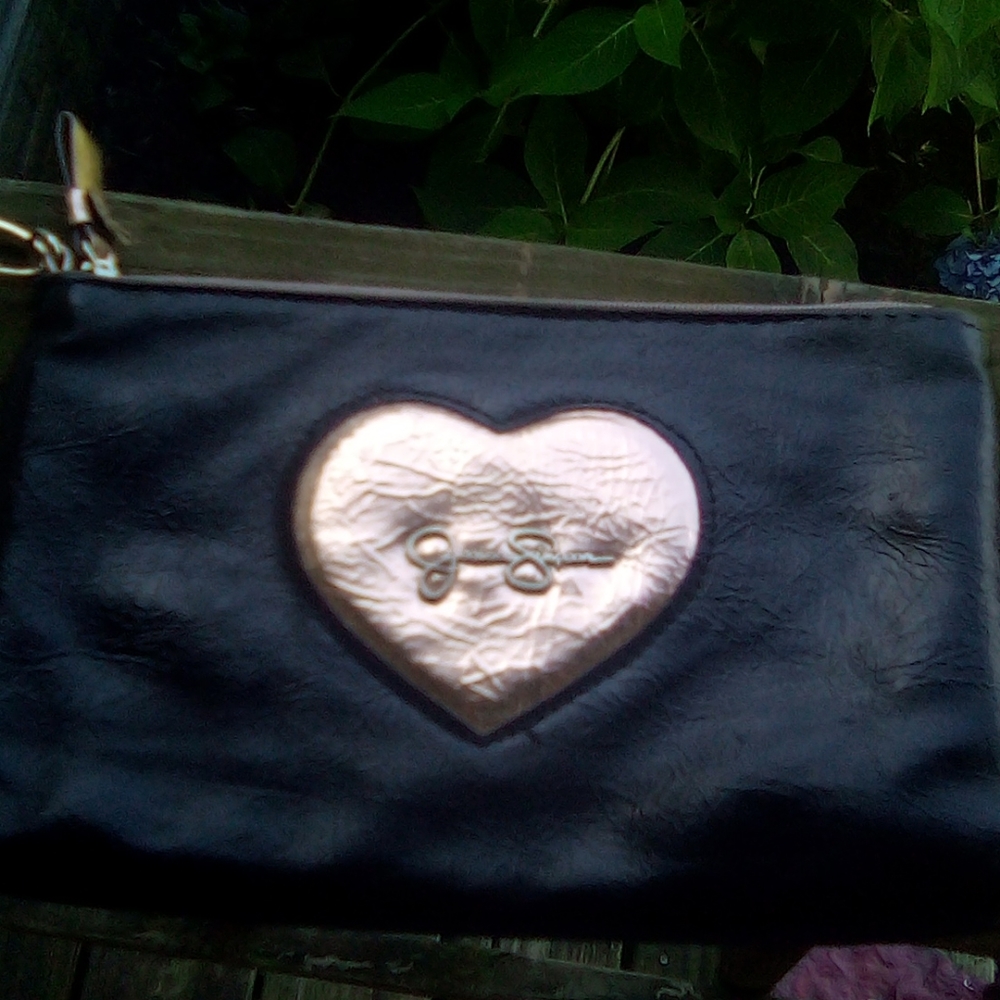 A black and gold handbag.